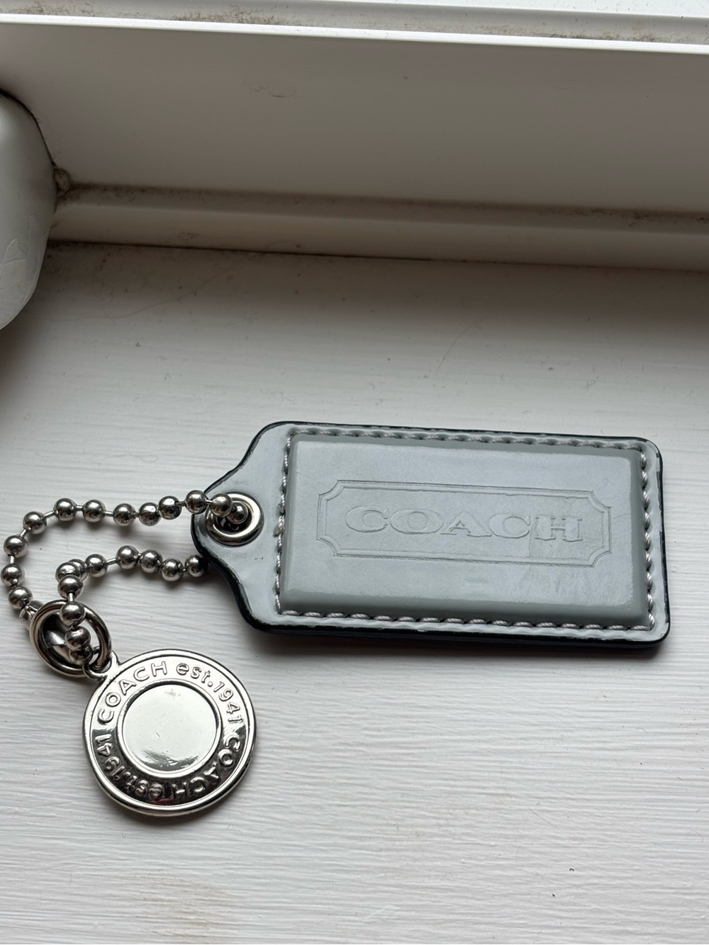 COACH Blue/Gray Leather Keychain Tag with Silver Medallion
